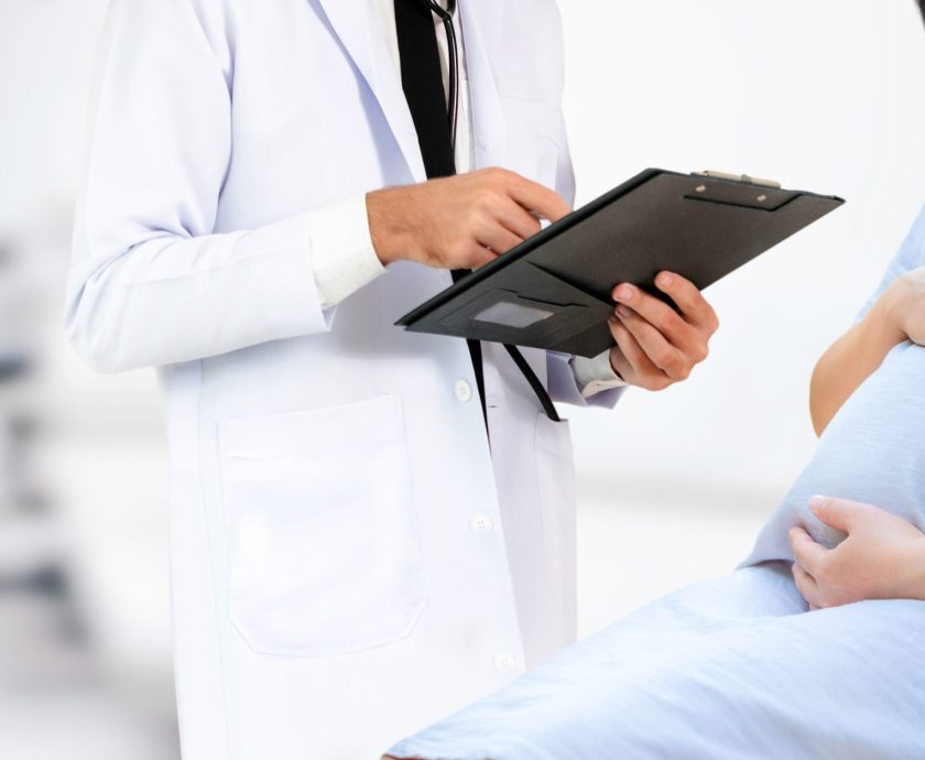 Pregnant Woman and Gynecologist Doctor at Hospital