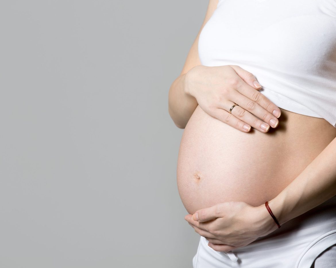 Mom-to-be, close-up of belly