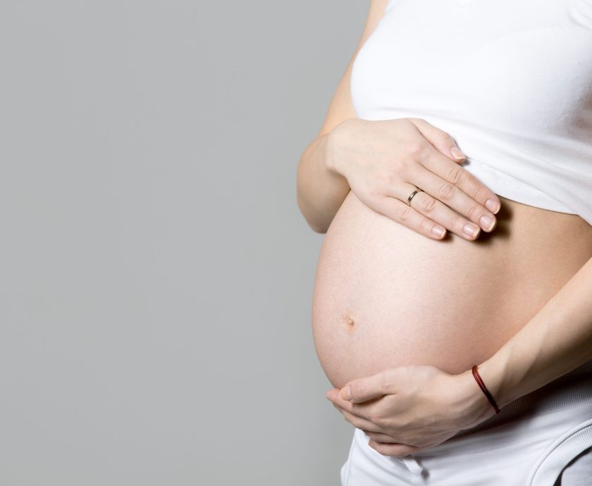 Mom-to-be, close-up of belly